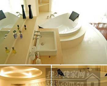 圆形的浴缸与天花板的圆弧形遥相呼应