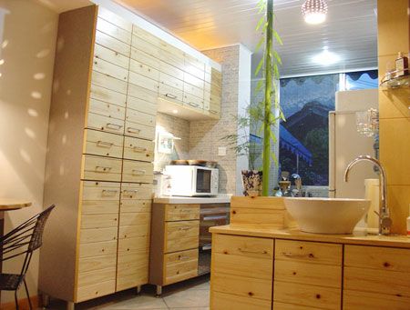 拆墙后改成了开放式厨房橱柜是木工作的