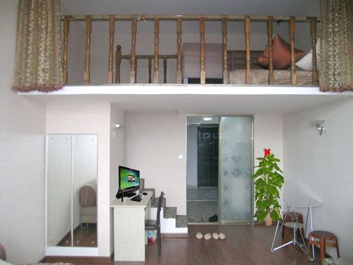 清新实木地板 巧装42平简约浪漫小公寓(组图) 