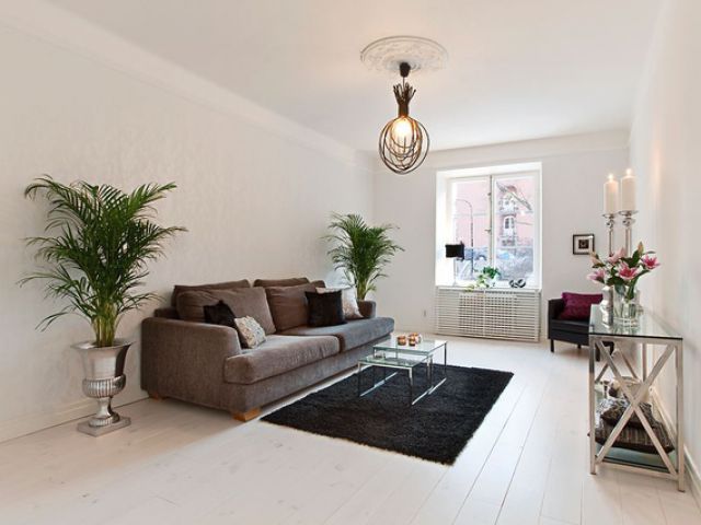 60平斯德哥尔摩公寓 白色地板打造干净空间(图) 