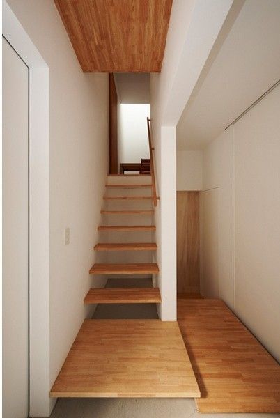 木质地板与白色混泥土墙体 打造清新简约空间 