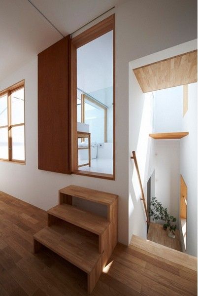 白色混泥土墙体木质家具 让家充满自然风(图) 