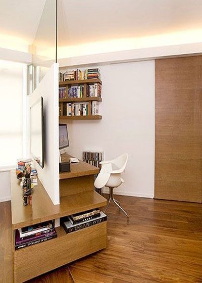 隔断拥有将一个空间划分为两个空间的功效，从而达到一室两用的功效，案例中的倾斜式创意隔断，同时连接着书房与客厅，既是书房桌面又是客厅电视背景墙，极具设计感