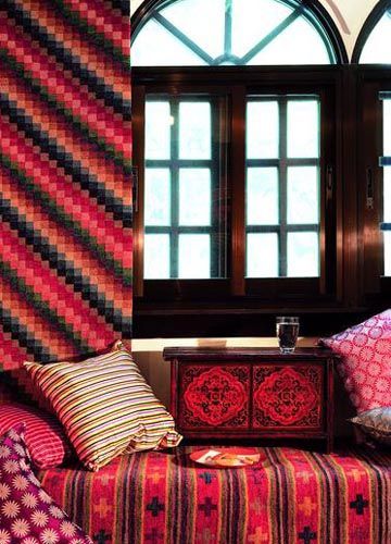 沉甸甸的手工织毯里织结着编织者精道的手艺和美好的祝福