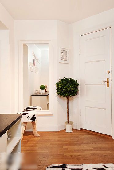 柚木复合地板 装扮57平时尚明朗单身公寓(图) 