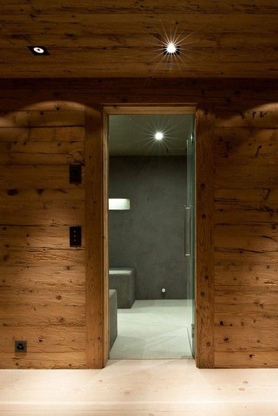 自然材料运用 温馨舒适的瑞士山景度假屋(图) 