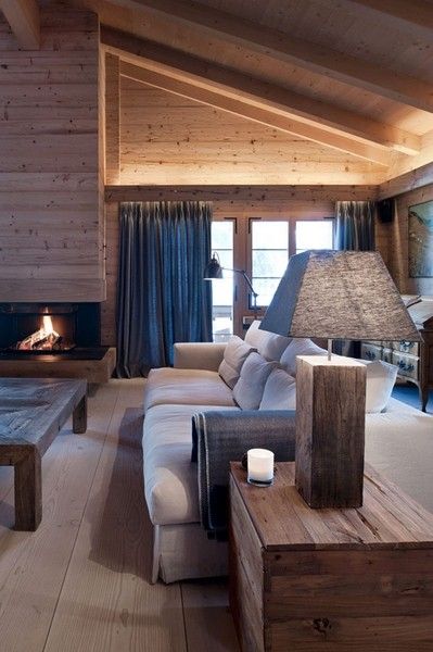 自然材料运用 温馨舒适的瑞士山景度假屋(图) 