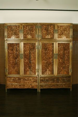 天津一品堂制作的金丝楠雕龙顶箱柜